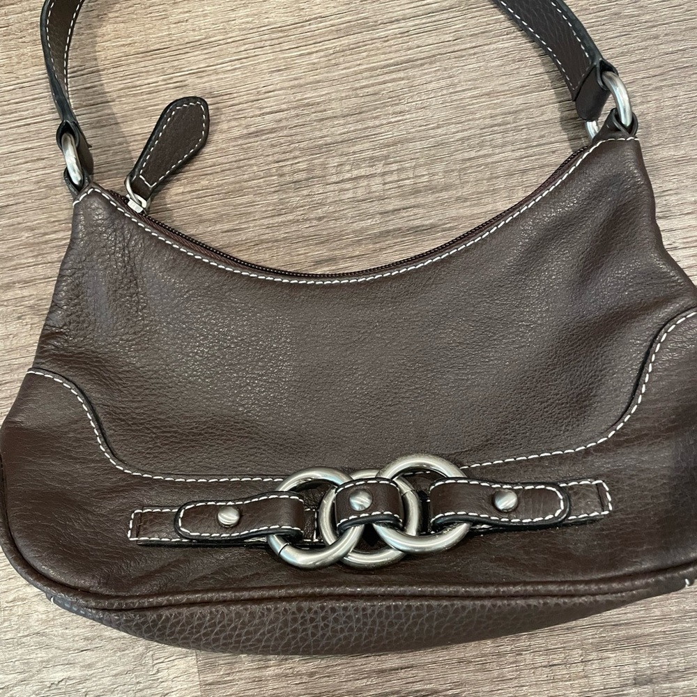 Wilsons Leather small brown purse.  Inside zip pocket. Fits wallet, keys, phone.